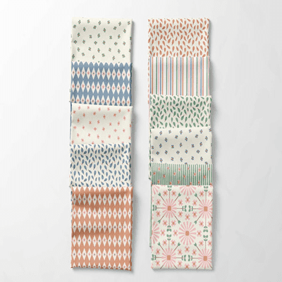 Fabric swatches from the Mediterranean Bloom collection by StudioMeggi, featuring pastel floral, stripe, and leaf patterns for children’s clothing